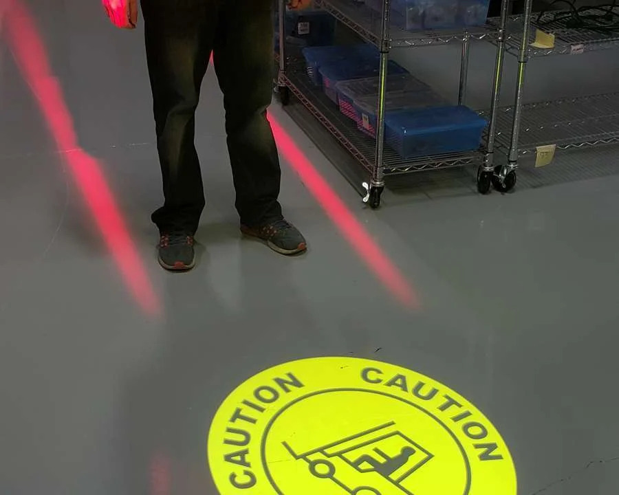 Laserglow projected walkway and safety signage