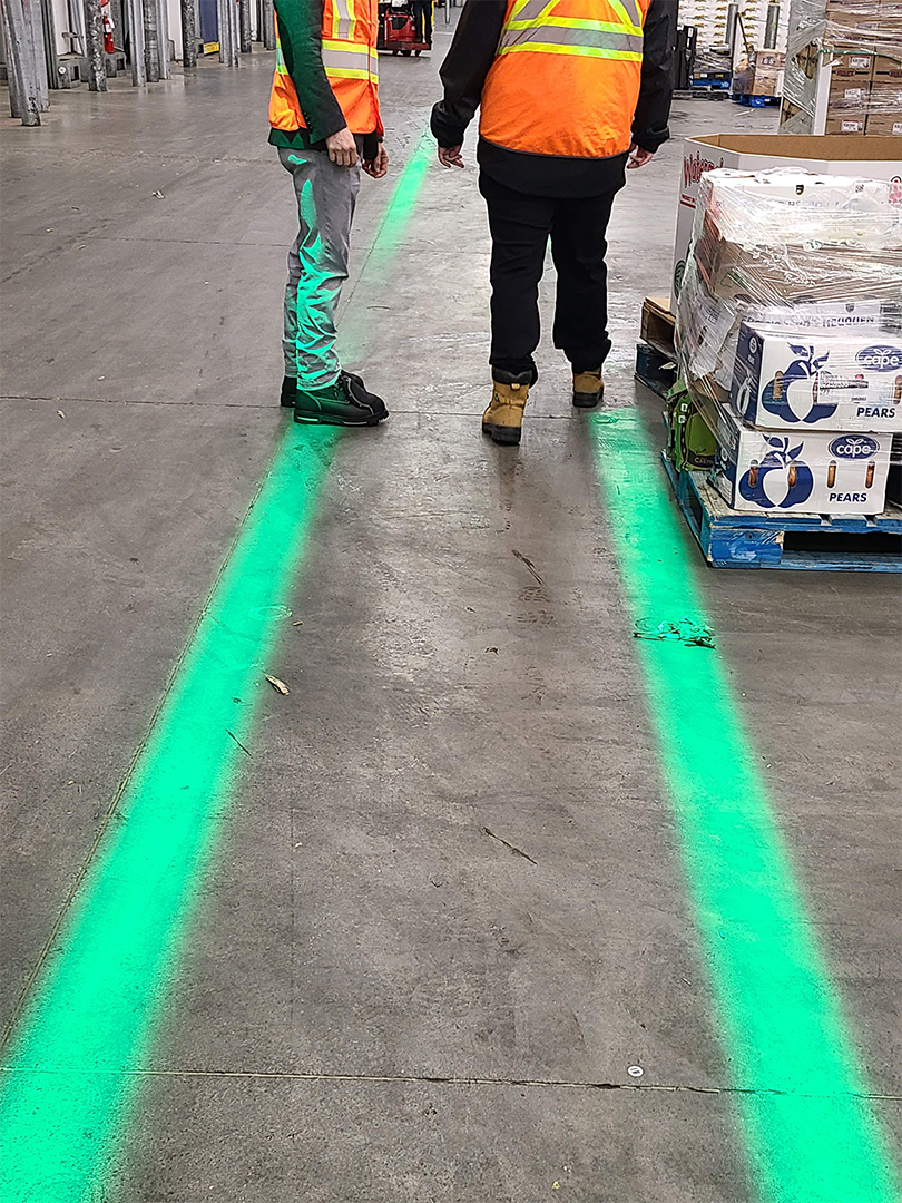 VirtuaLine green Lines projected onto the floor marking the pedestrian path