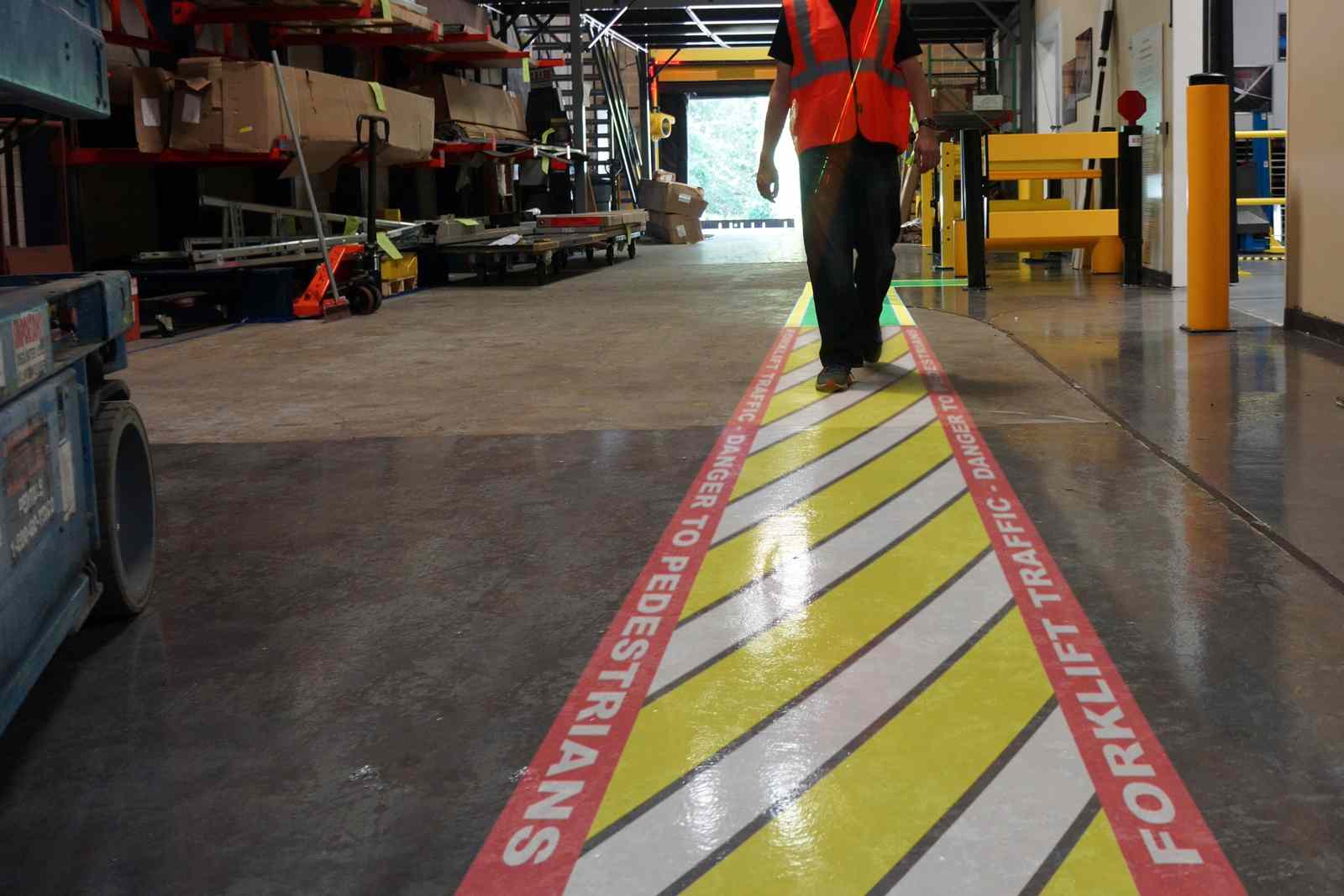 Person walking on SafetyCast Projected Crosswalk