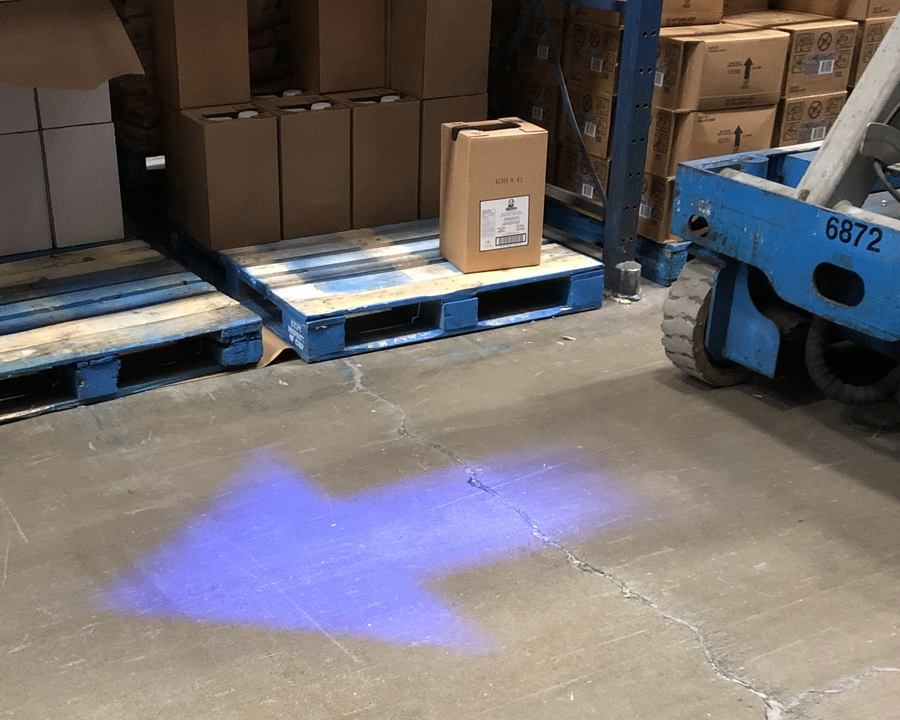 Thick Blue Arrow Projected onto the warehouse floor