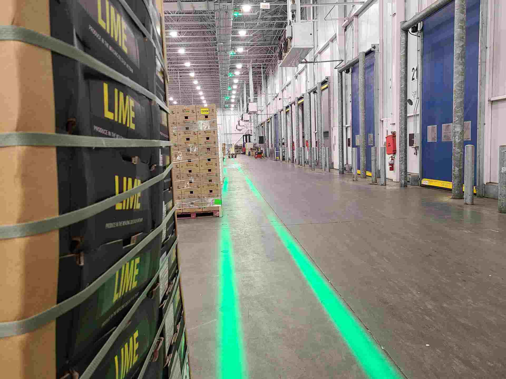 VirtuaLine Green Projected Lines used as a Pedestrian Lane
