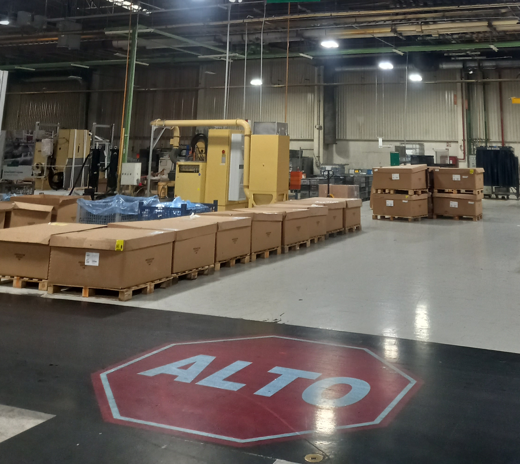 Large red "Alto" Sign projected onto the floor for intersection management