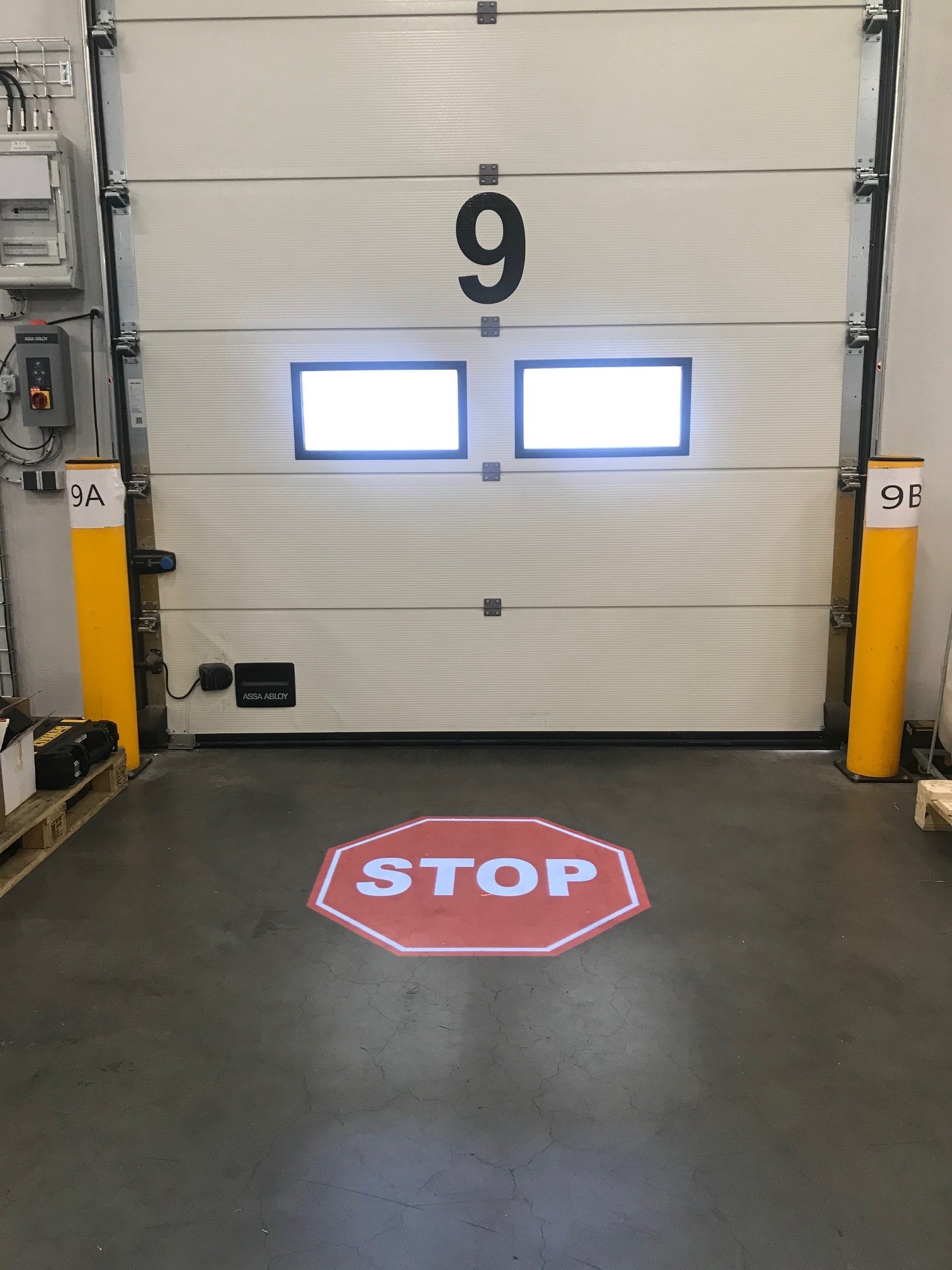 SafetyCast Projected "Stop" Sign near the loading door